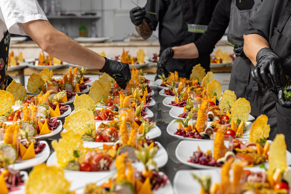 cooks-are-garnishing-appetizer-plates-2026-01-08-02-40-04-utc.jpg